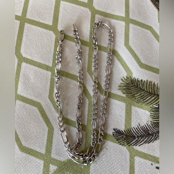 925 genuine Sterling from Italy/stamped Figaro chain.